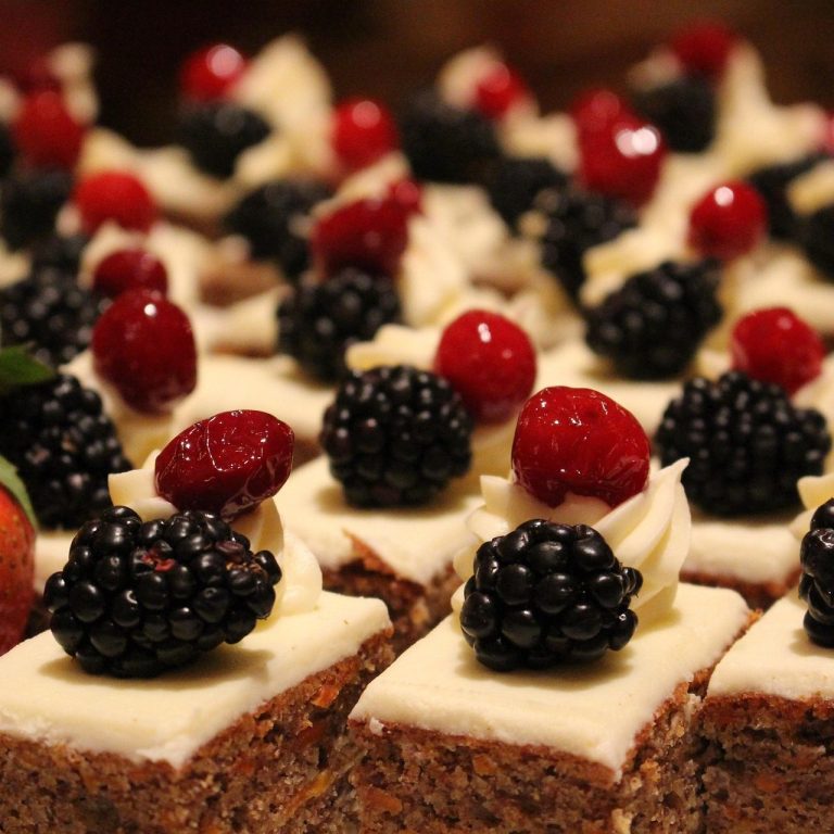 Hotel guest enjoying breakfast buffet with fresh pastries, coffee, and travel guide