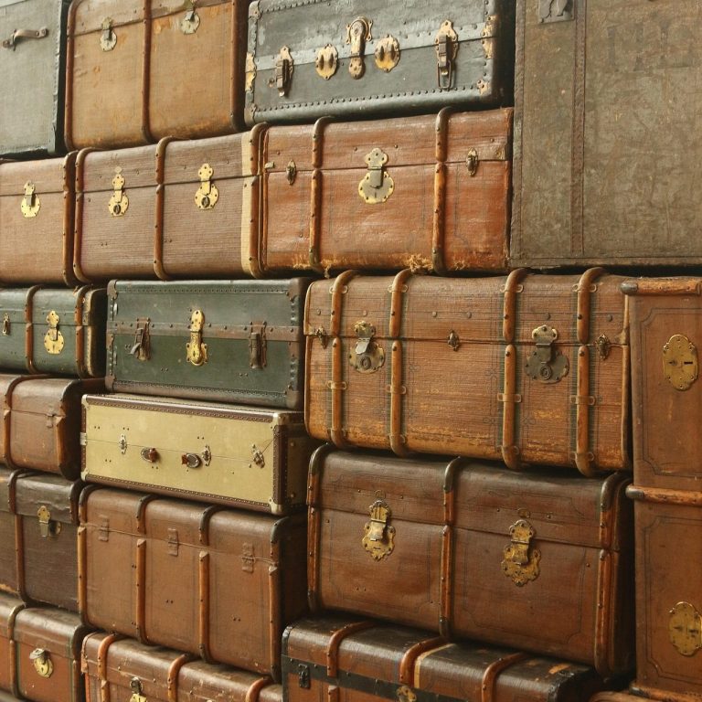 Packing for a cruise in a stateroom with a private balcony, offering breathtaking sea views and ultimate travel comfort.