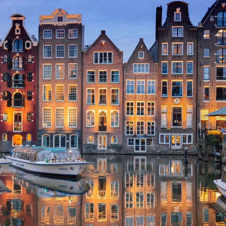 insider tips for A luxury cruise ship glides across clear Caribbean waters, symbolizing stress-free travel and ocean adventure.