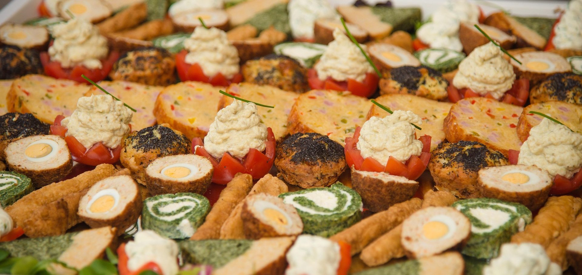 Cooking class with a chef teaching tourists how to prepare regional dishes
