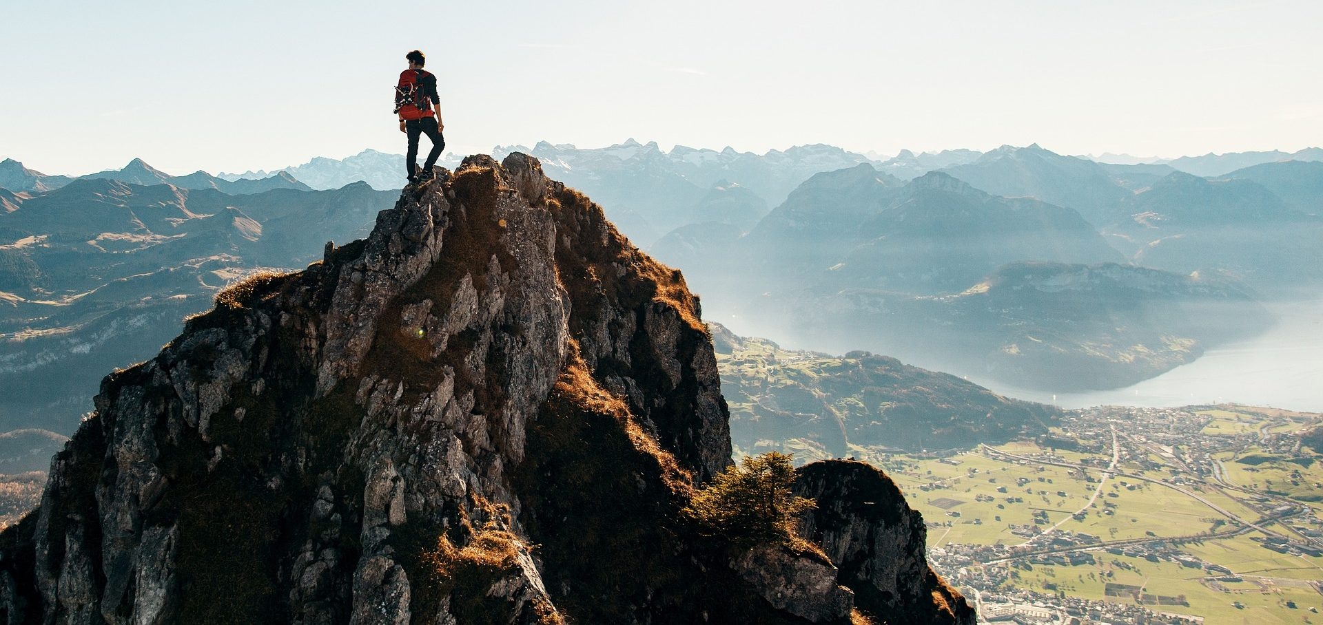Discover your traveler type and plan your next adventure Adventure traveler hiking to a mountain lake on a scenic journey