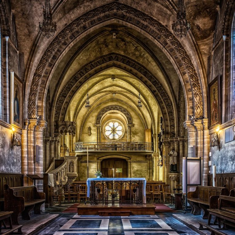 Faith-based and spiritual travel experiences worldwide Spiritual traveler visiting a historic church on pilgrimage